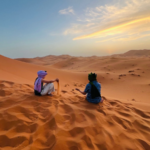 Best time to visit Merzouga desert spring sunset camel trekking Morocco Tours Data Agency.